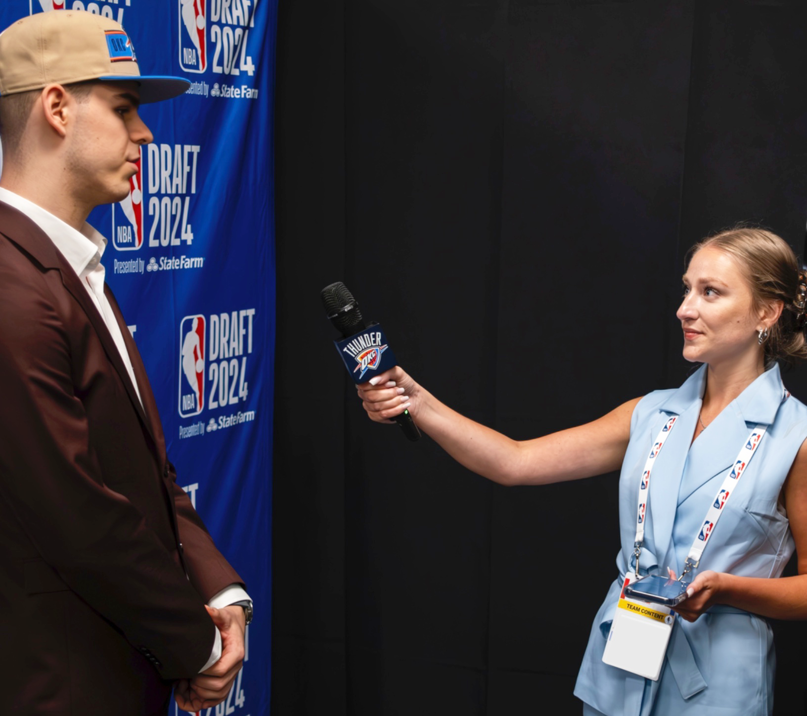Brooke Brennan interviewing an OKC player