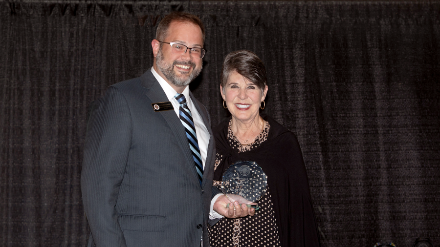 Stef Gall (right) and Kevin Derryberry (left) at an awards ceremony