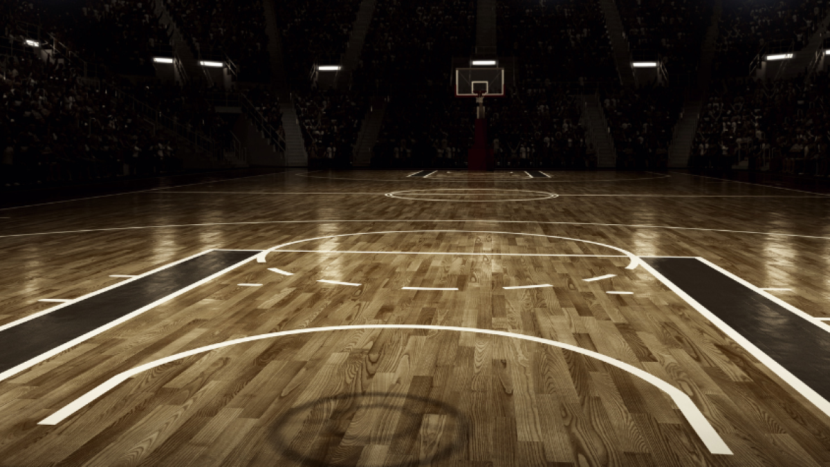 Dim lit empty basketball court