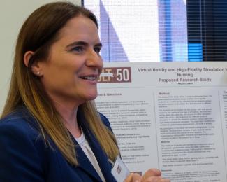 student presenting at a research conference