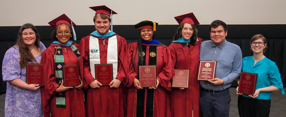 Hardee Hooding 2024 Award winners holding plaques